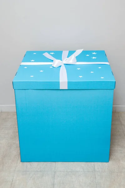 blue surprise box with gifts
