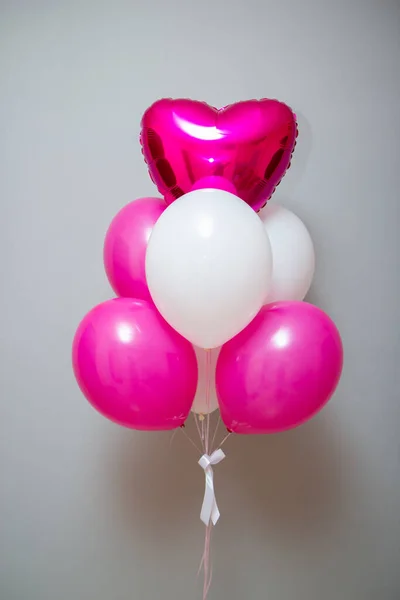 bunch of pink balloons with helium, birthday
