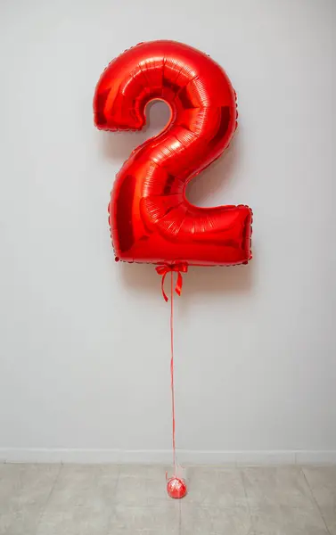 set of red balloons - numbers and a bunch of latex balloons with helium