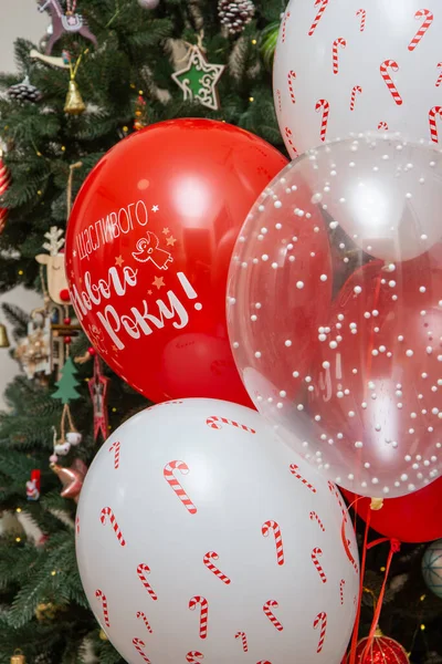 red and white balloons, the inscription on the balloon \