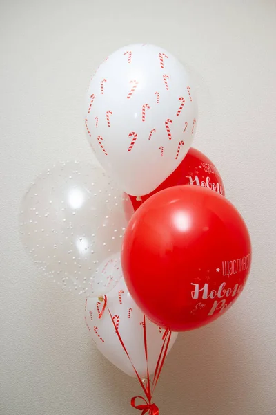 red and white balloons, the inscription on the balloon \