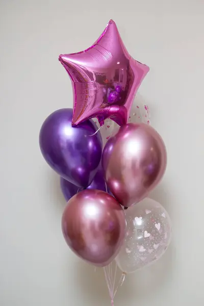 a bouquet of pink balloons on a white background, the inscription on the balloon \