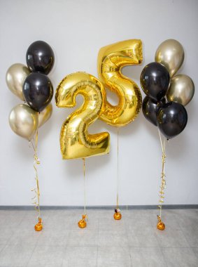 gold and black balloons, gold numbers 25