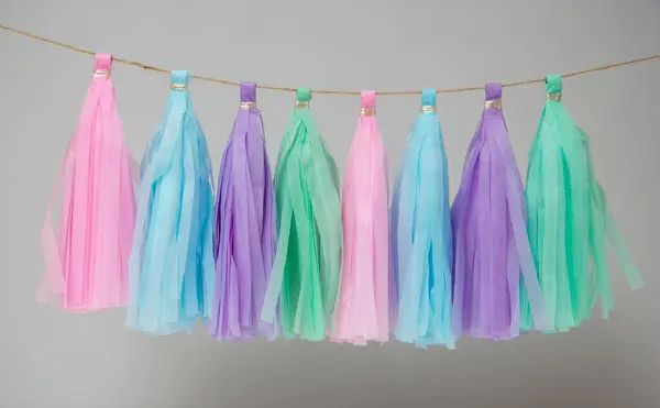stock image bright paper tassel garland for holiday decor