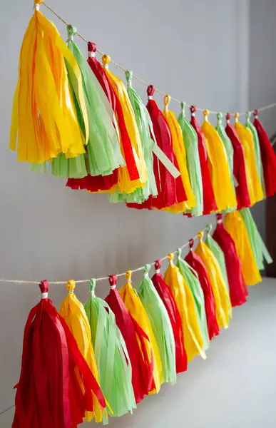 stock image bright paper tassel garland for holiday decor