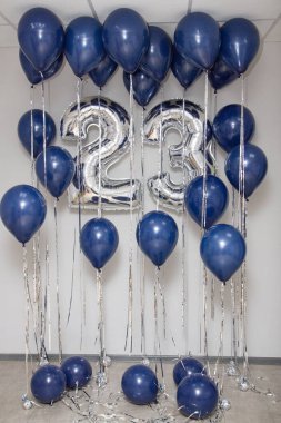 silver number 23 balloons and a bouquet of blue latex helium balloons clipart