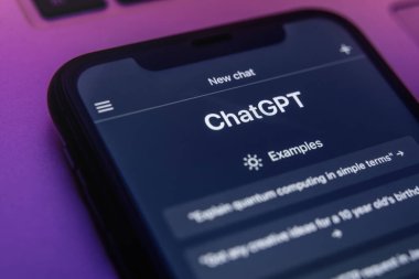 Antalya, Turkey - May 8, 2023: The ChatGPT chatbot on a mobile phone screen in neon light. ChatGPT language model utilizing Open AI's state-of-the-art technology, is accessible through any device.  clipart