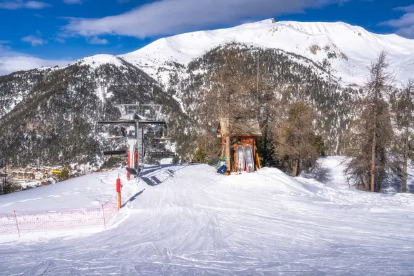 stock image View on the exit from ski lift and small hut with winter sport equipment, Montgenevre ski village on the border of France and Italy in Cottian Alps