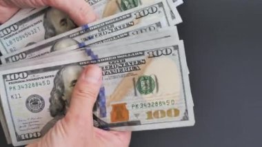 Money counting. Counting american dollars. 