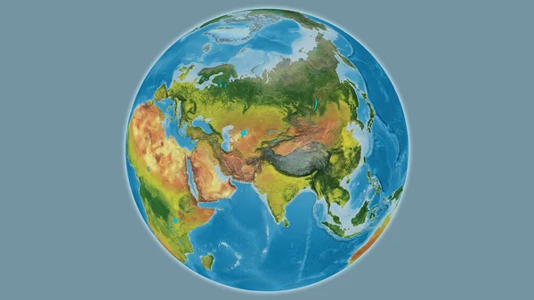 Topographic globe map centered on Tajikistan
