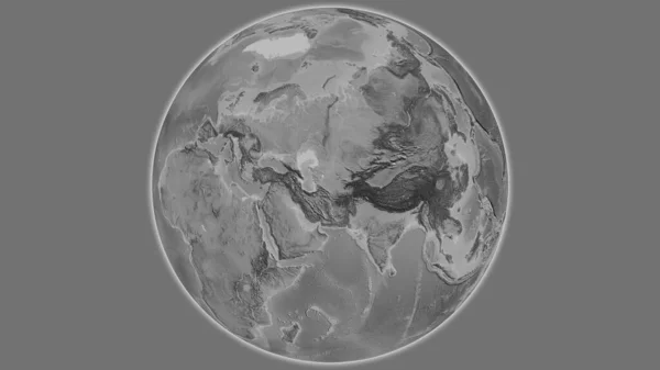 Grayscale globe map centered on Turkmenistan