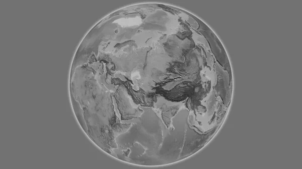 Grayscale globe map centered on Uzbekistan