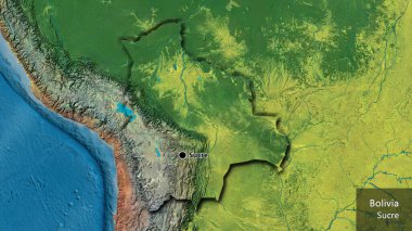 Bir topografik haritada Bolivya sınır bölgesinin yakın çekimleri. Ana nokta. Kırsal kesimin kıvrımlı kenarları. Ülkenin ve başkentinin İngilizce adı