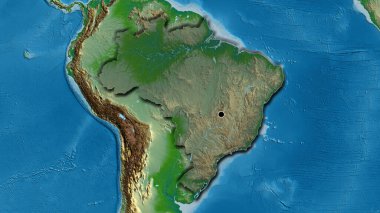 Brezilya sınır bölgesinin yakın çekimi fiziksel bir harita üzerinde koyu bir örtüyle vurgulanıyor. Ana nokta. Ülkenin kıvrımlı kenarları. 