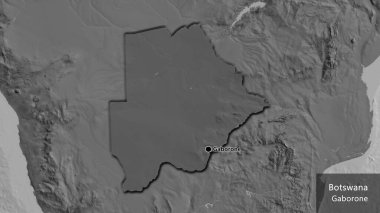 Botswana sınır bölgesinin yakın çekimleri, bilek haritasında koyu bir örtüyle vurgulanıyor. Ana nokta. Kırsal kesimin kıvrımlı kenarları. Ülkenin ve başkentinin İngilizce adı