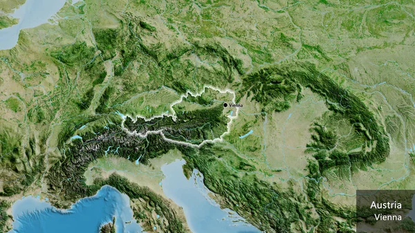 衛星地図上のオーストリア国境地域の閉鎖 資本ポイント 国の形の周りに光る 英名国とその首都 — ストック写真