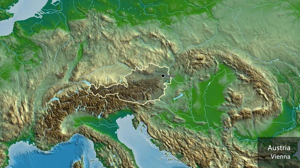 物理的な地図上の暗いオーバーレイで強調オーストリア国境地域のクローズアップ 資本ポイント 国の形の周りの概要 英名国とその首都 — ストック写真