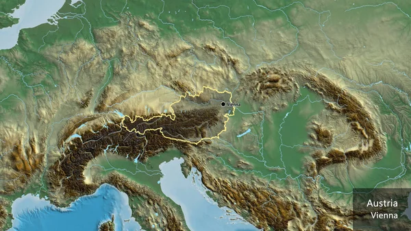 オーストリア国境地域のクローズアップは 救援地図上の暗いオーバーレイで強調表示されます 資本ポイント 国の形の周りの概要 英名国とその首都 — ストック写真