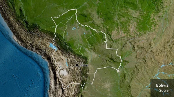 在卫星地图上对玻利维亚边境地区及其区域边界进行了密切监视 资本点 概略地描述一下国家的面貌 国家及其首都的英文名称 — 图库照片