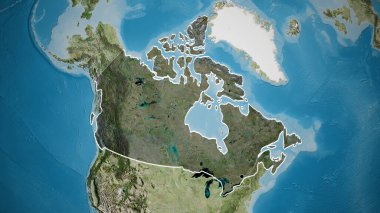 Kanada sınır bölgesinin yakın çekimleri, uydu haritasında koyu bir örtüyle vurgulanıyor. Ana nokta. Ülke şekli etrafında özet geç. 