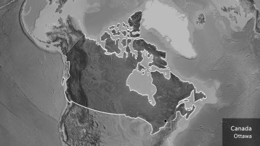 Kanada sınır bölgesinin yakın çekimleri gri tonlu bir haritada koyu bir örtüyle vurgulanıyor. Ana nokta. Ülke çapında bir taslak oluşturun. Ülkenin ve başkentinin İngilizce adı