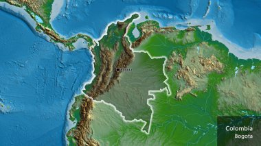 Kolombiya sınır bölgesinin yakın çekimleri fiziksel bir haritada koyu bir örtüyle vurgulanıyor. Ana nokta. Ülke çapında parıldıyor. Ülkenin ve başkentinin İngilizce adı