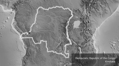 Demokratik Kongo Cumhuriyeti 'nin yakın planında gri tonlu bir harita var. Ana nokta. Ülke çapında parıldıyor. Ülkenin ve başkentinin İngilizce adı