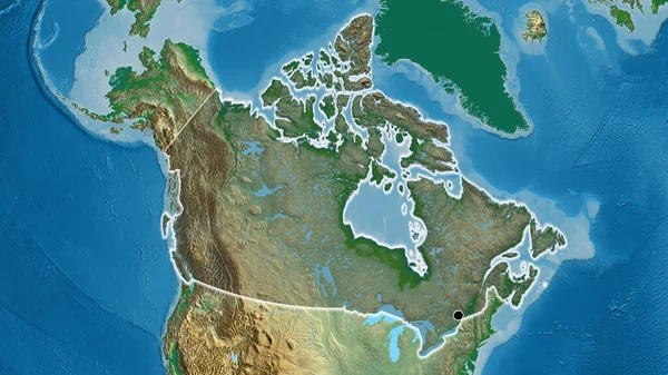 物理的な地図上の暗いオーバーレイで強調されているカナダの国境地域のクローズアップ 資本ポイント 全国に光る — ストック写真