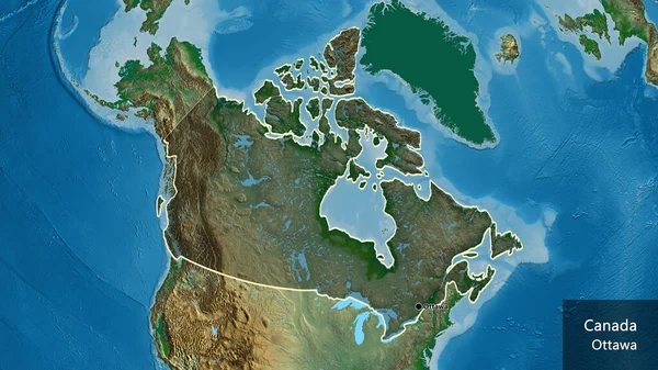 物理的な地図上の暗いオーバーレイで強調されているカナダの国境地域のクローズアップ 資本ポイント 国の形の周りの概要 英名国とその首都 — ストック写真