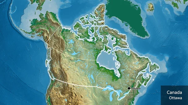 カナダの国境地域とその地域の境界線の物理的な地図上のクローズアップ 資本ポイント 国の形の周りに光る 英名国とその首都 — ストック写真