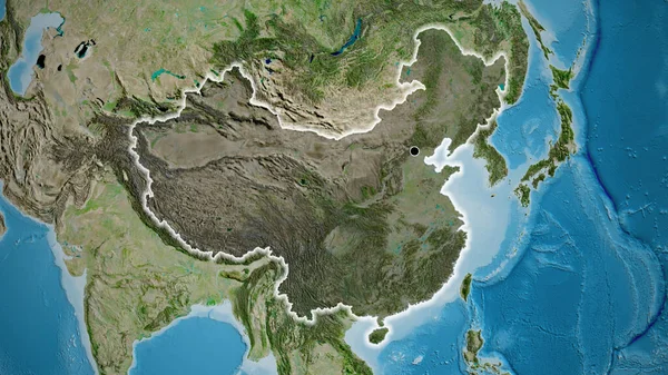 Close-up of the China border area highlighting with a dark overlay on a satellite map. Capital point. Glow around the country shape.