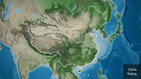 Close-up of the China border area on a satellite map. Capital point. Outline around the country shape. English name of the country and its capital