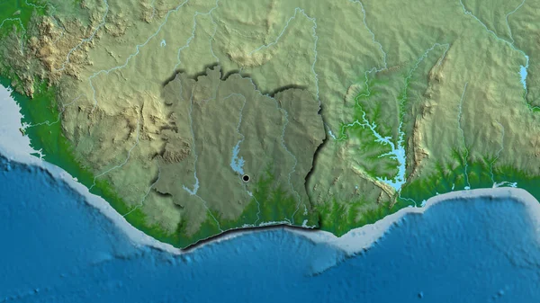 物理的な地図上の暗いオーバーレイで強調象牙海岸境界領域のクローズアップ 資本ポイント 国の形の縁が隠されている — ストック写真