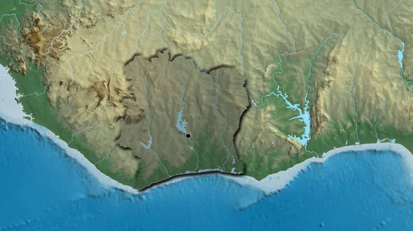 象牙海岸国境付近のクローズアップは 救援地図上の暗いオーバーレイで強調表示されます 資本ポイント 国の形の縁が隠されている — ストック写真