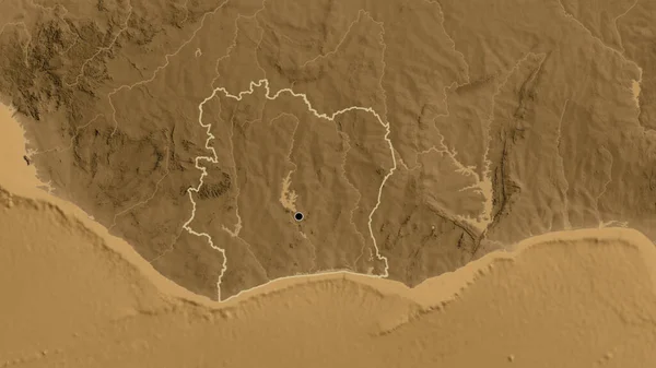 セピア標高地図上の象牙海岸境界地域の閉鎖 資本ポイント 全国の概要 — ストック写真