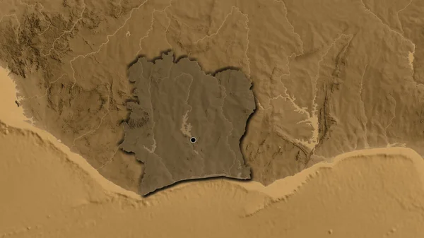 象牙海岸の境界領域のクローズアップは セピア標高マップ上の暗いオーバーレイで強調表示されます 資本ポイント 国の形の縁が隠されている — ストック写真