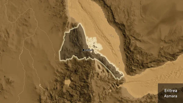 エリトリア境界地域のクローズアップは セピア標高地図上の暗いオーバーレイで強調しています 資本ポイント 国の形の周りに光る 英名国とその首都 — ストック写真
