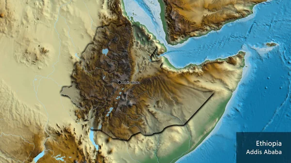 埃塞俄比亚边境地区的特写镜头突出显示了一张救济地图上的黑暗阴影 资本点 这个国家的边缘呈斜角状 国家及其首都的英文名称 — 图库照片