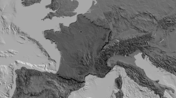 Close-up of the France border area highlighting with a dark overlay on a bilevel map. Capital point. Bevelled edges of the country shape.