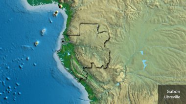 Gabon sınır bölgesinin fiziksel bir haritada yakın plan görüntüsü. Ana nokta. Kırsal kesimin kıvrımlı kenarları. Ülkenin ve başkentinin İngilizce adı