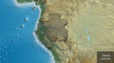 Gabon sınır bölgesinin yakın çekimleri bir yardım haritasında koyu bir örtüyle vurgulanıyor. Ana nokta. Kırsal kesimin kıvrımlı kenarları. Ülkenin ve başkentinin İngilizce adı