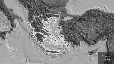 Yunanistan sınır bölgesinin bir bileklik haritasında yakın plan fotoğrafı. Ana nokta. Ülke çapında parıldıyor. Ülkenin ve başkentinin İngilizce adı