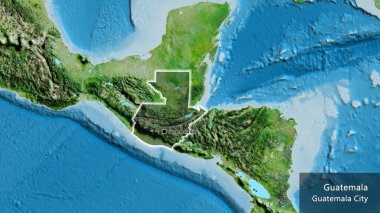 Guatemala sınır bölgesinin yakın planında uydu haritasında koyu bir örtüyle vurgulanıyor. Ana nokta. Ülke çapında parıldıyor. Ülkenin ve başkentinin İngilizce adı