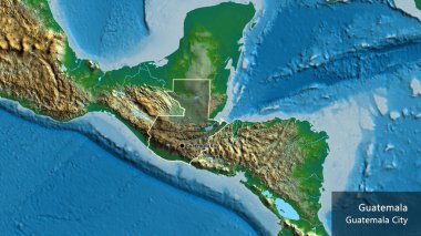Guatemala sınır bölgesinin yakın çekimleri fiziksel bir haritada koyu bir örtüyle vurgulanıyor. Ana nokta. Ülke çapında bir taslak oluşturun. Ülkenin ve başkentinin İngilizce adı