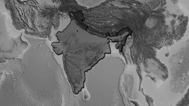 Hindistan sınır bölgesinin yakın çekimleri gri tonlu bir haritada koyu bir örtüyle vurgulanıyor. Ana nokta. Ülkenin kıvrımlı kenarları. 