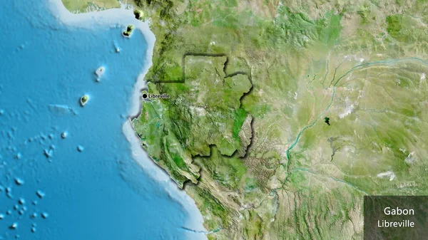 stock image Close-up of the Gabon border area on a satellite map. Capital point. Bevelled edges of the country shape. English name of the country and its capital