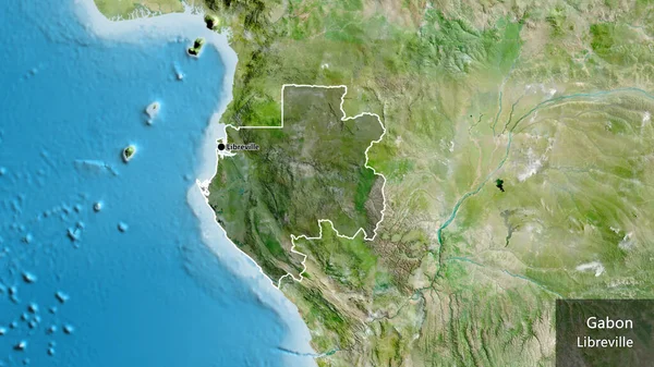 加蓬边境地区的特写镜头 用卫星地图上的黑暗阴影突出显示出来 资本点 概略地描述一下国家的面貌 国家及其首都的英文名称 — 图库照片