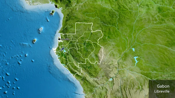 在卫星地图上对加蓬边境地区及其区域边界进行了密切监视 资本点 概略地描述一下国家的面貌 国家及其首都的英文名称 — 图库照片