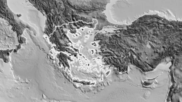 在一张灰色比例尺地图上对希腊边境地区进行的密切监视 资本点 风靡全国 — 图库照片