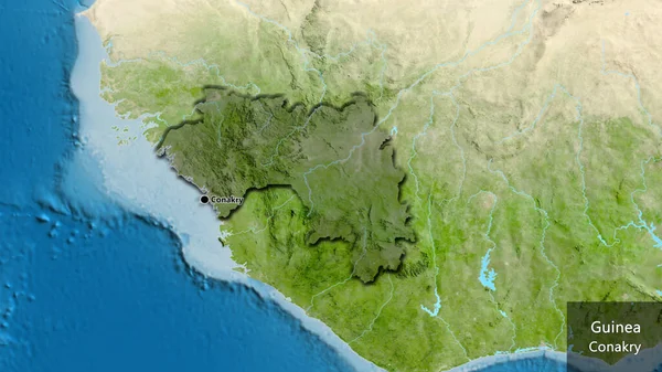 Крупный План Приграничной Зоны Гвинеи Выделяющийся Тёмным Наложением Спутниковую Карту — стоковое фото